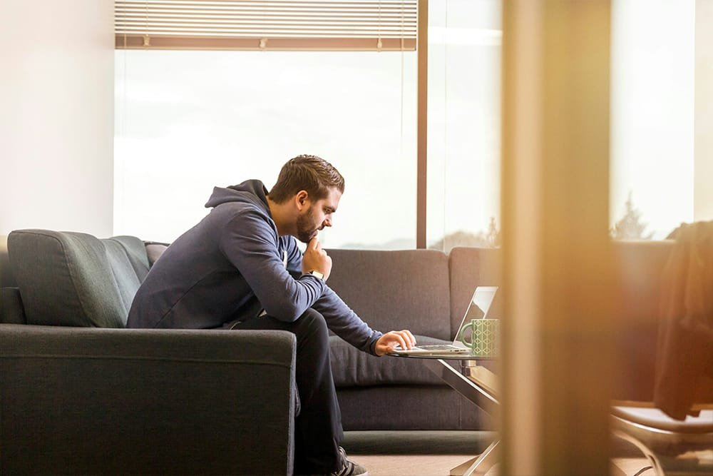 man working on a laptop
